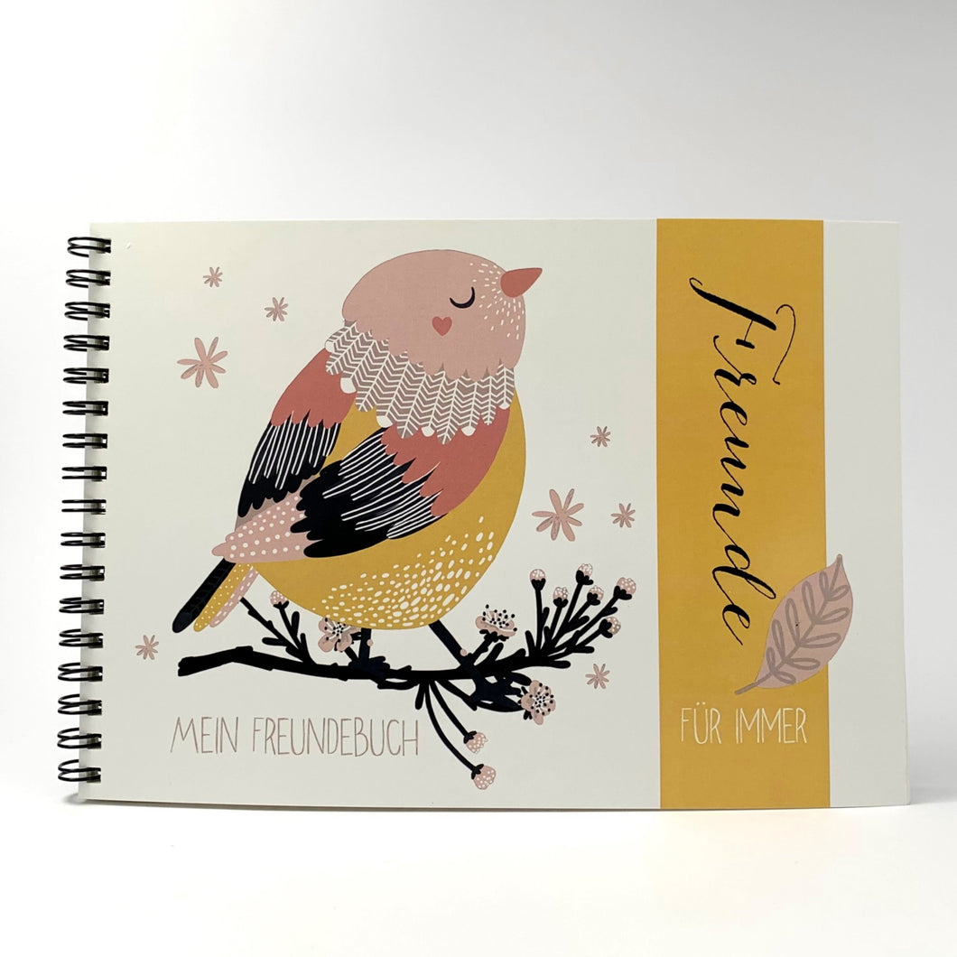 Titelseite Freundebuch Vogel in Ockergelb Rosa hergestellt von Schatzl's Schatzkisterl aus Österreich